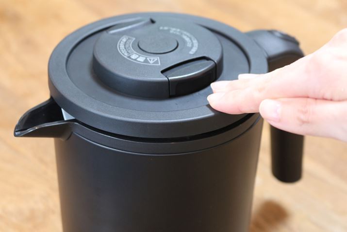 Khóa bấm đóng nắp an toàn ấm siêu tốc Tiger